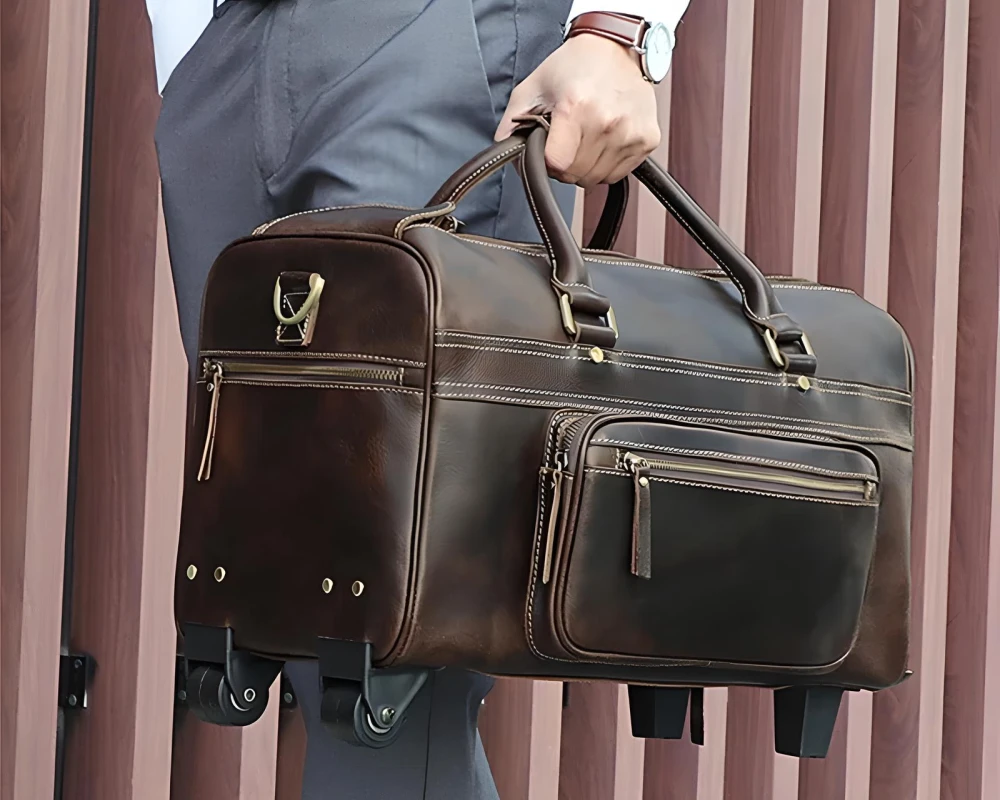 brown leather carry on bag